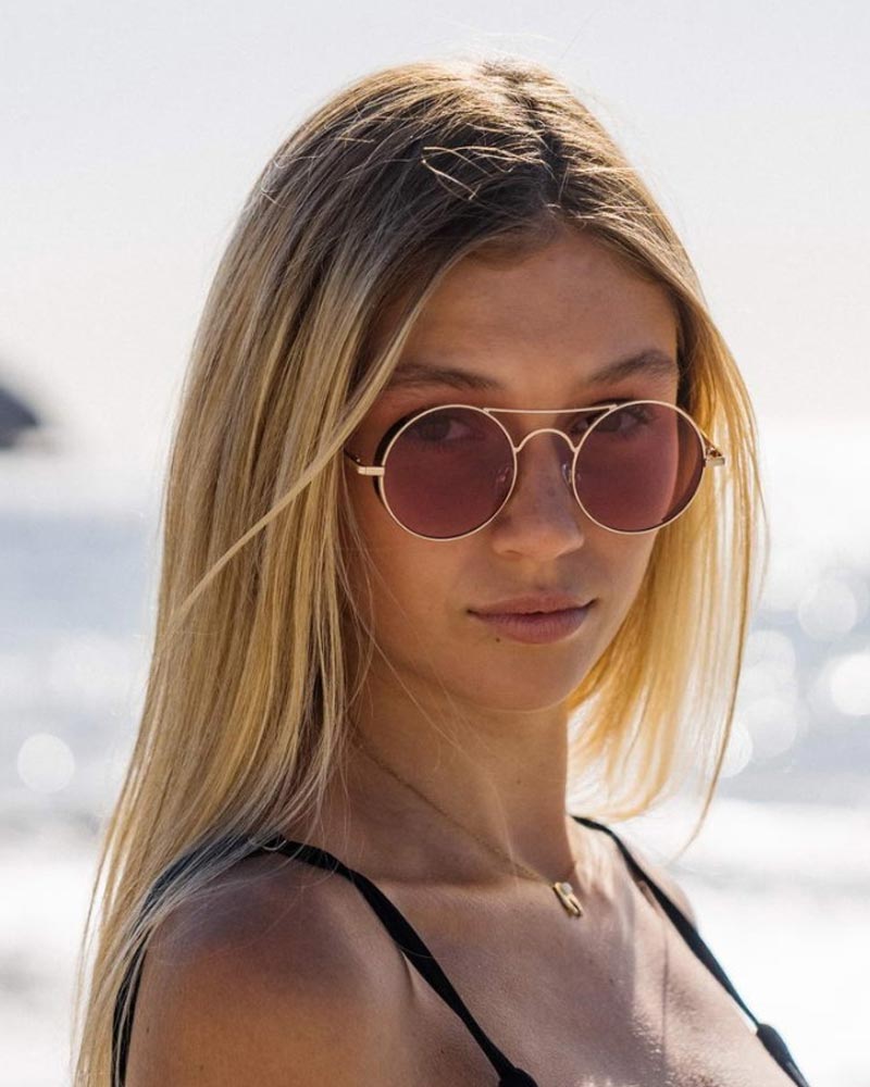 Heart-shaped sunglasses with pink lenses