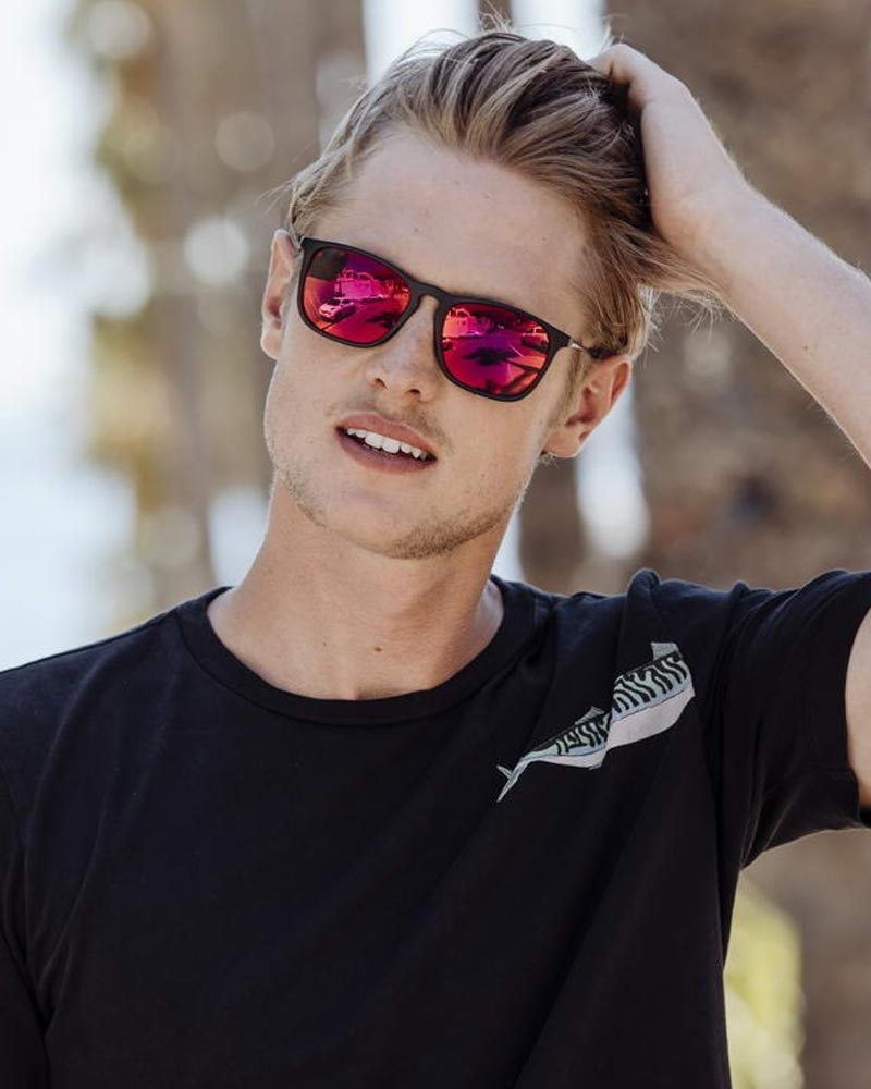 Heart-shaped sunglasses with pink lenses