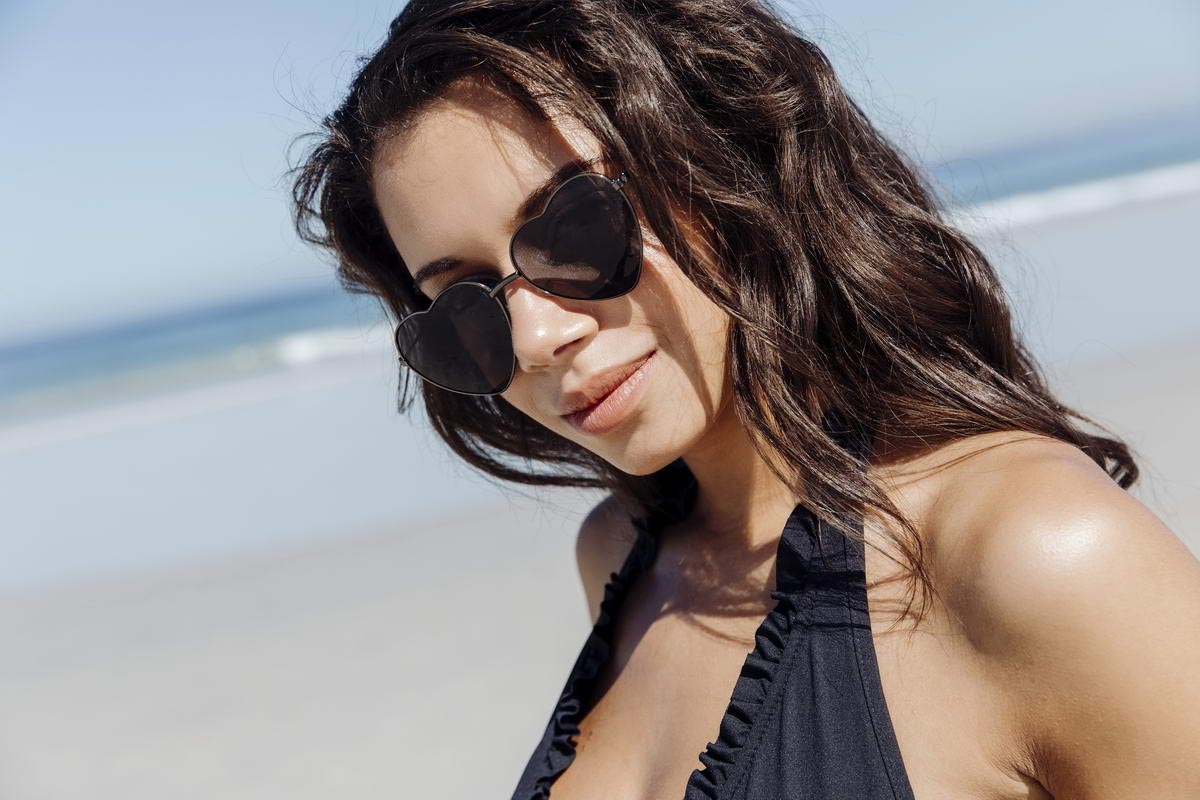 Heart-shaped sunglasses with pink lenses