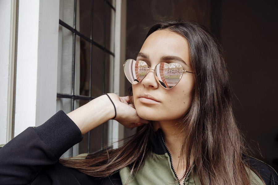 Heart-shaped sunglasses with pink lenses