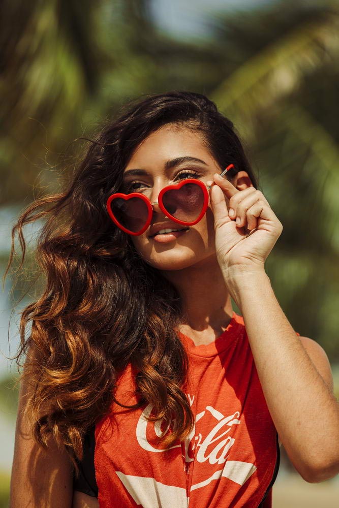 Heart-shaped sunglasses with pink lenses