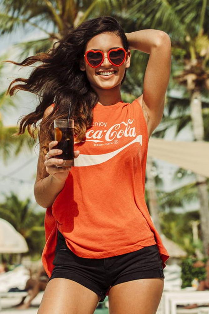 Heart-shaped sunglasses with pink lenses