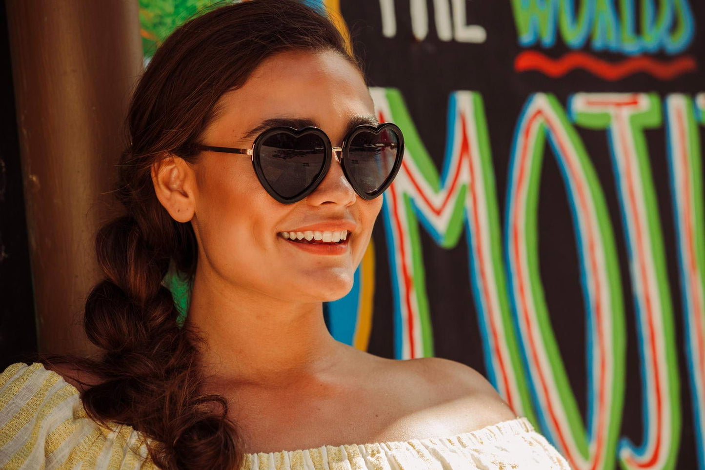 Heart-shaped sunglasses with pink lenses