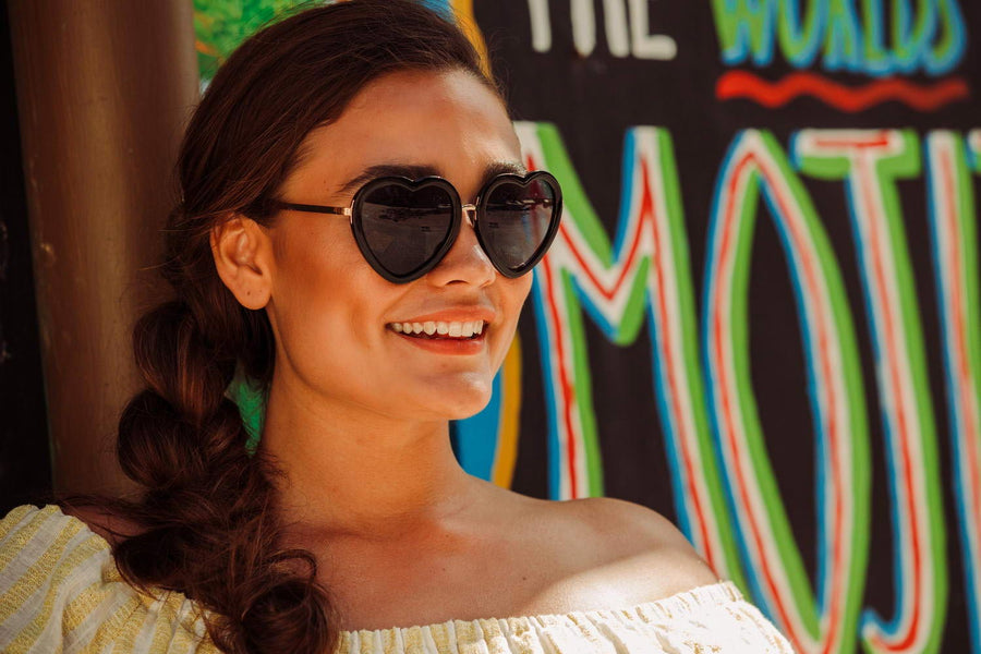 Heart-shaped sunglasses with pink lenses