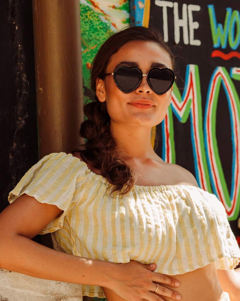 Heart-shaped sunglasses with pink lenses