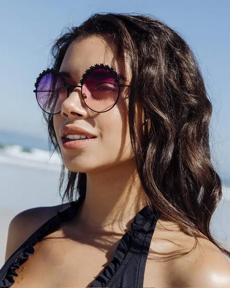 Heart-shaped sunglasses with pink lenses