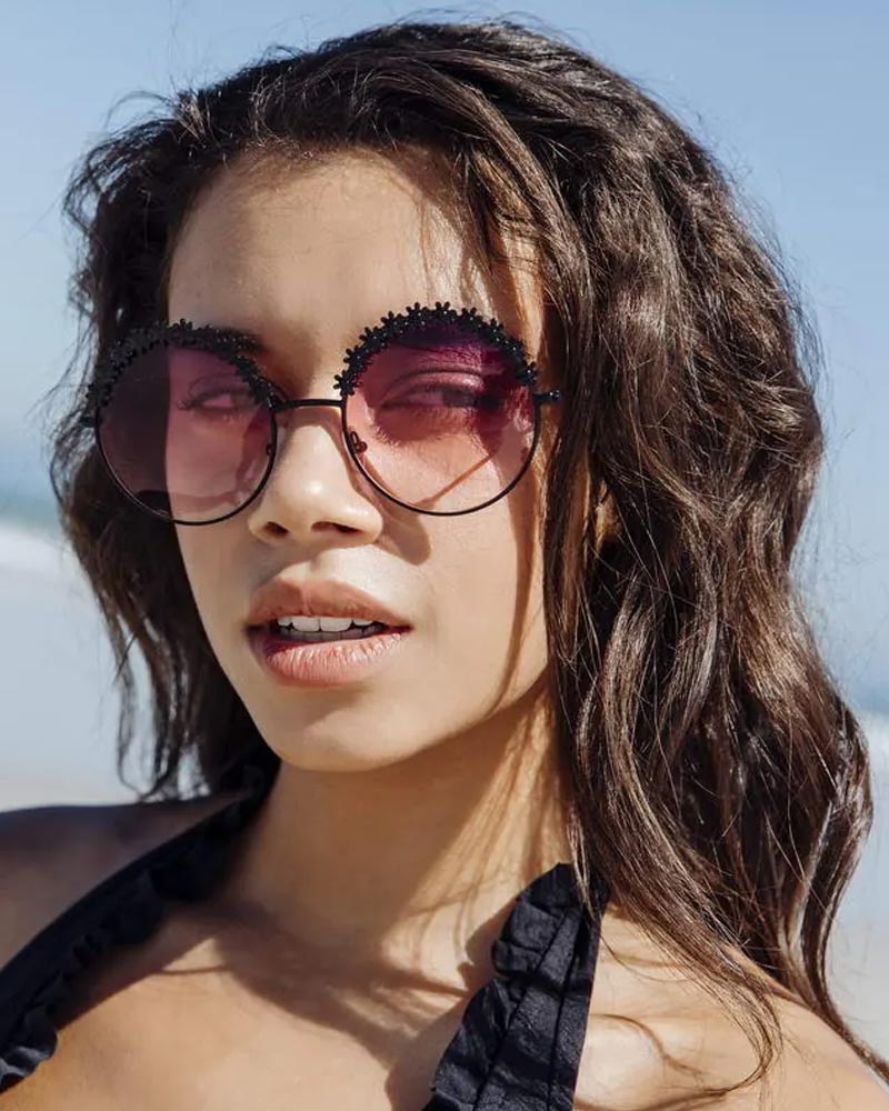 Heart-shaped sunglasses with pink lenses