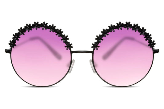 Heart-shaped sunglasses with pink lenses