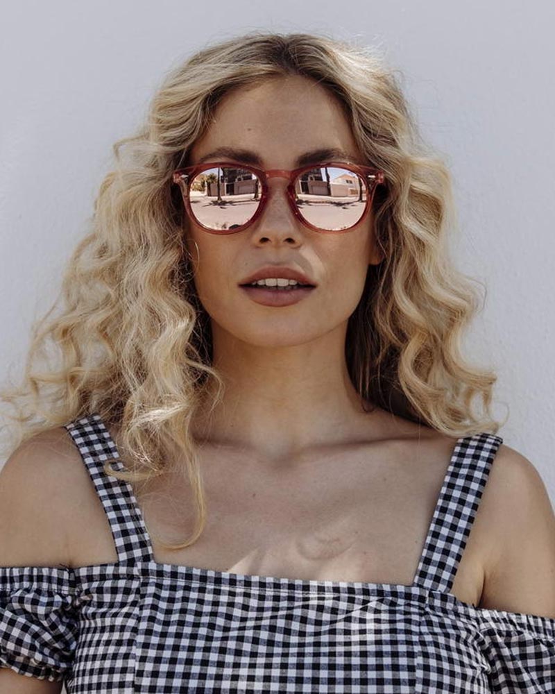 Heart-shaped sunglasses with pink lenses