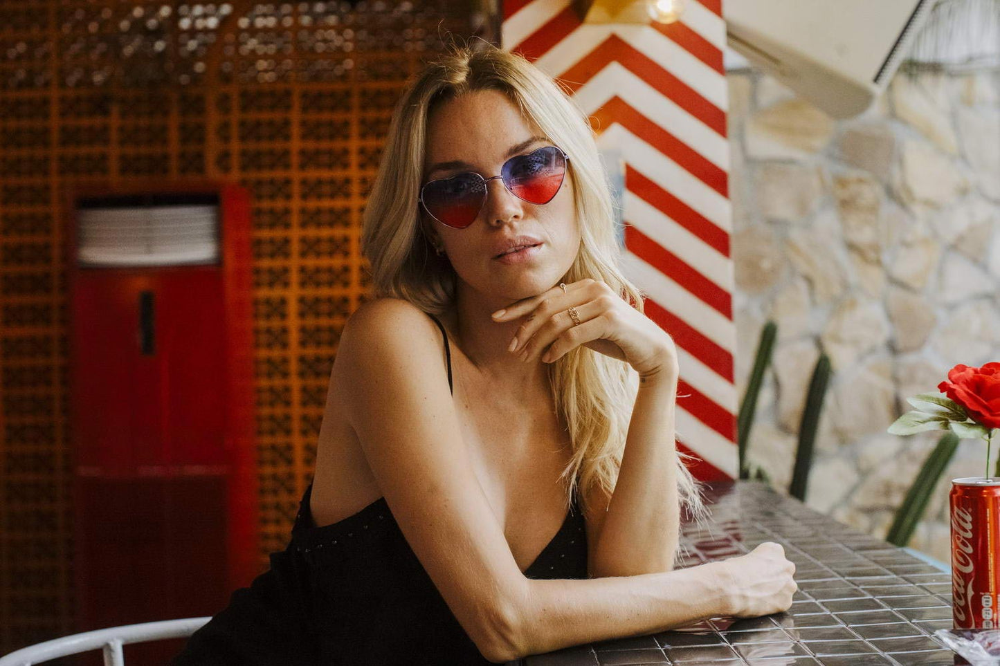 Heart-shaped sunglasses with pink lenses
