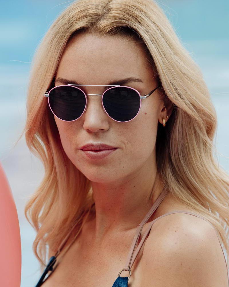 Heart-shaped sunglasses with pink lenses