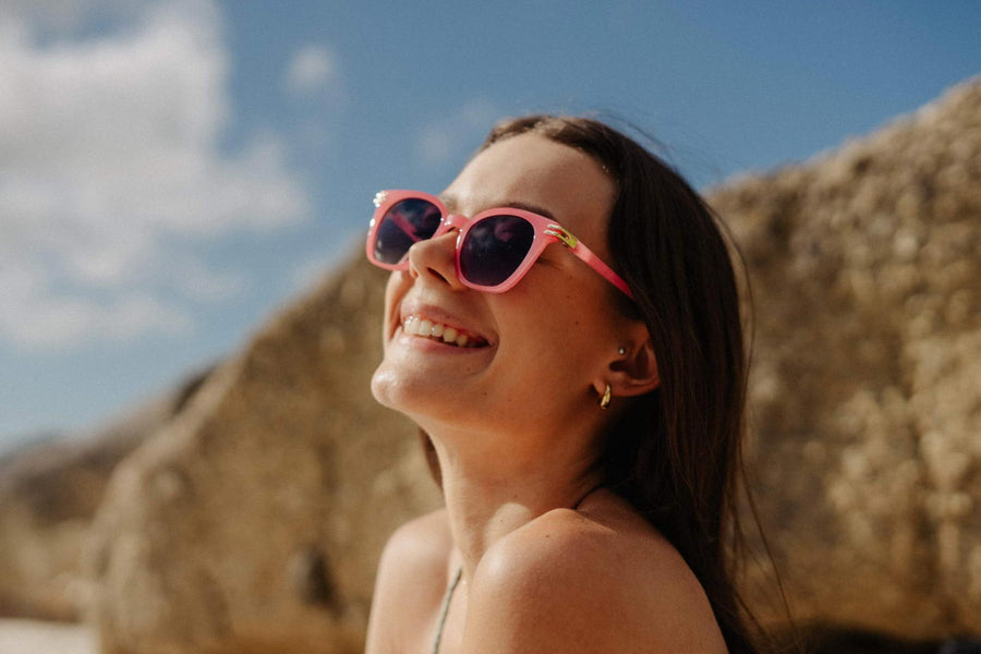 Heart-shaped sunglasses with pink lenses