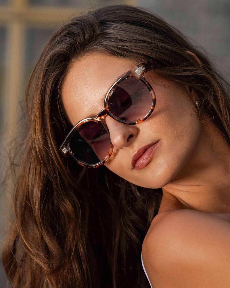 Heart-shaped sunglasses with pink lenses