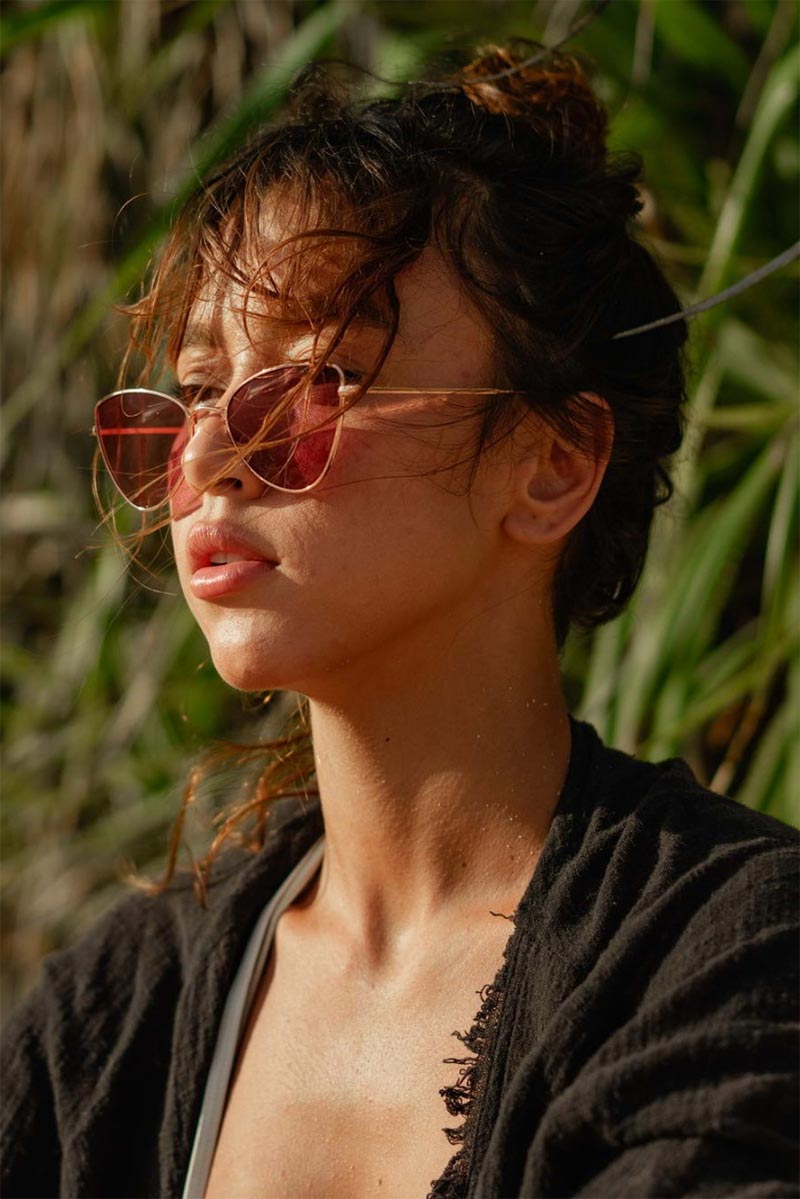 Heart-shaped sunglasses with pink lenses