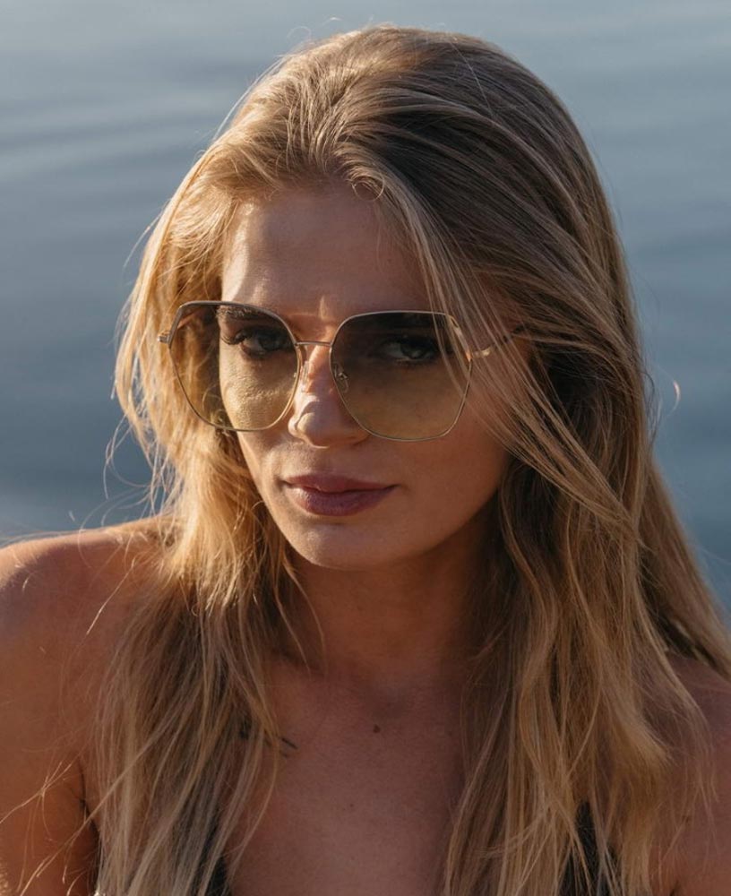 Heart-shaped sunglasses with pink lenses