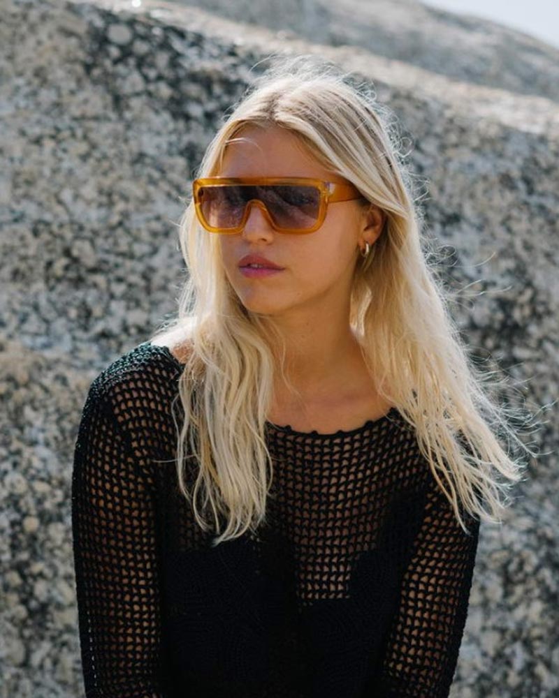 Heart-shaped sunglasses with pink lenses