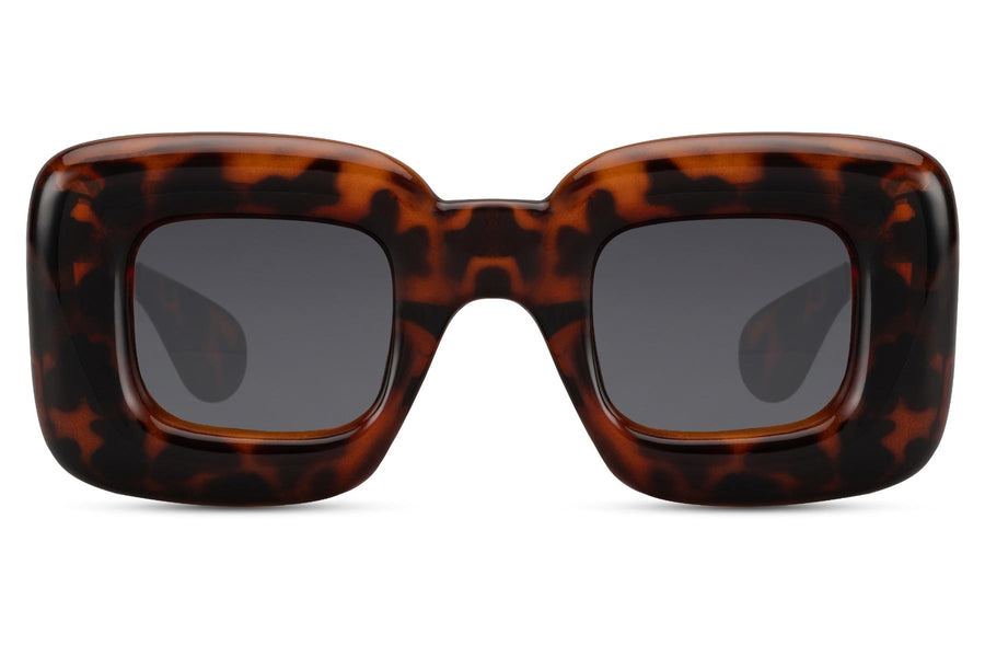 Heart-shaped sunglasses with pink lenses