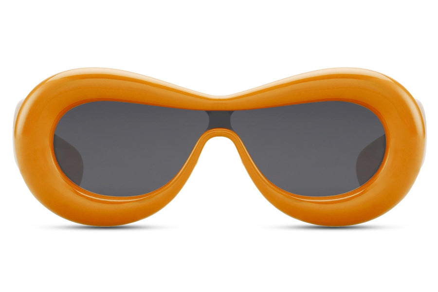 Heart-shaped sunglasses with pink lenses