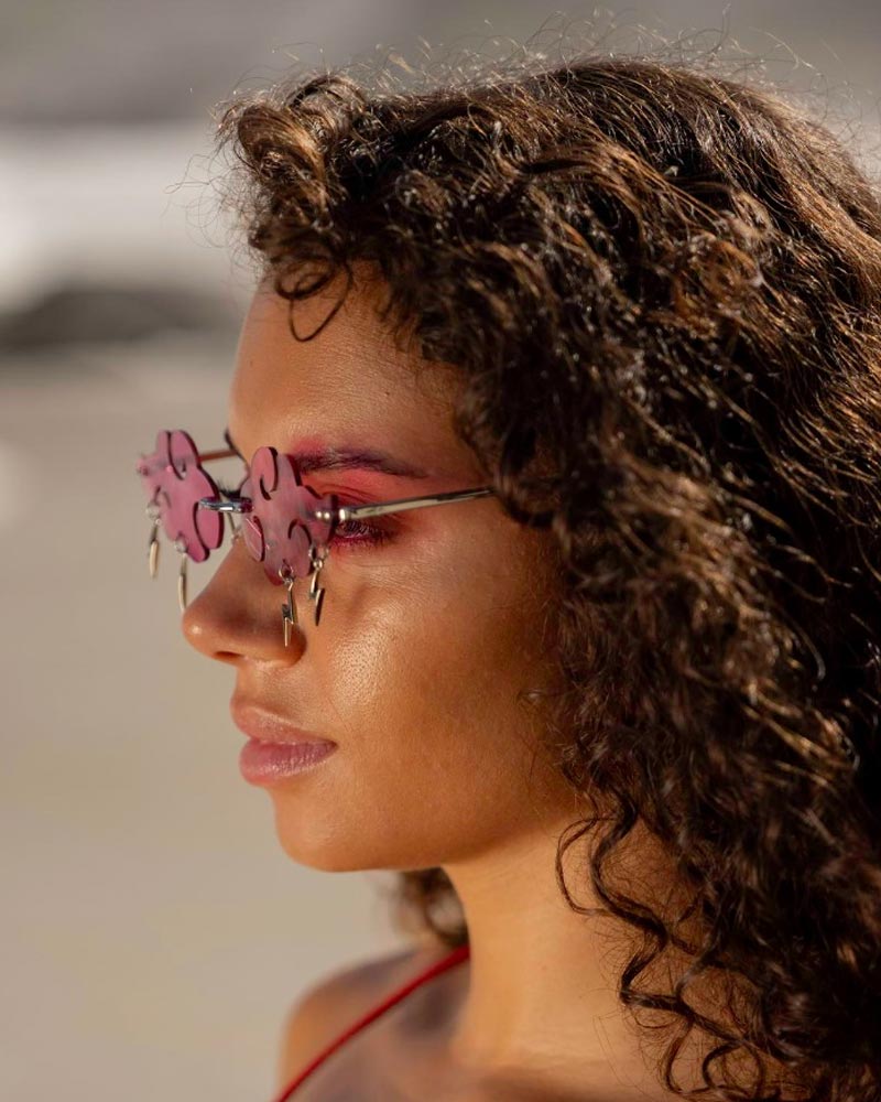 Heart-shaped sunglasses with pink lenses