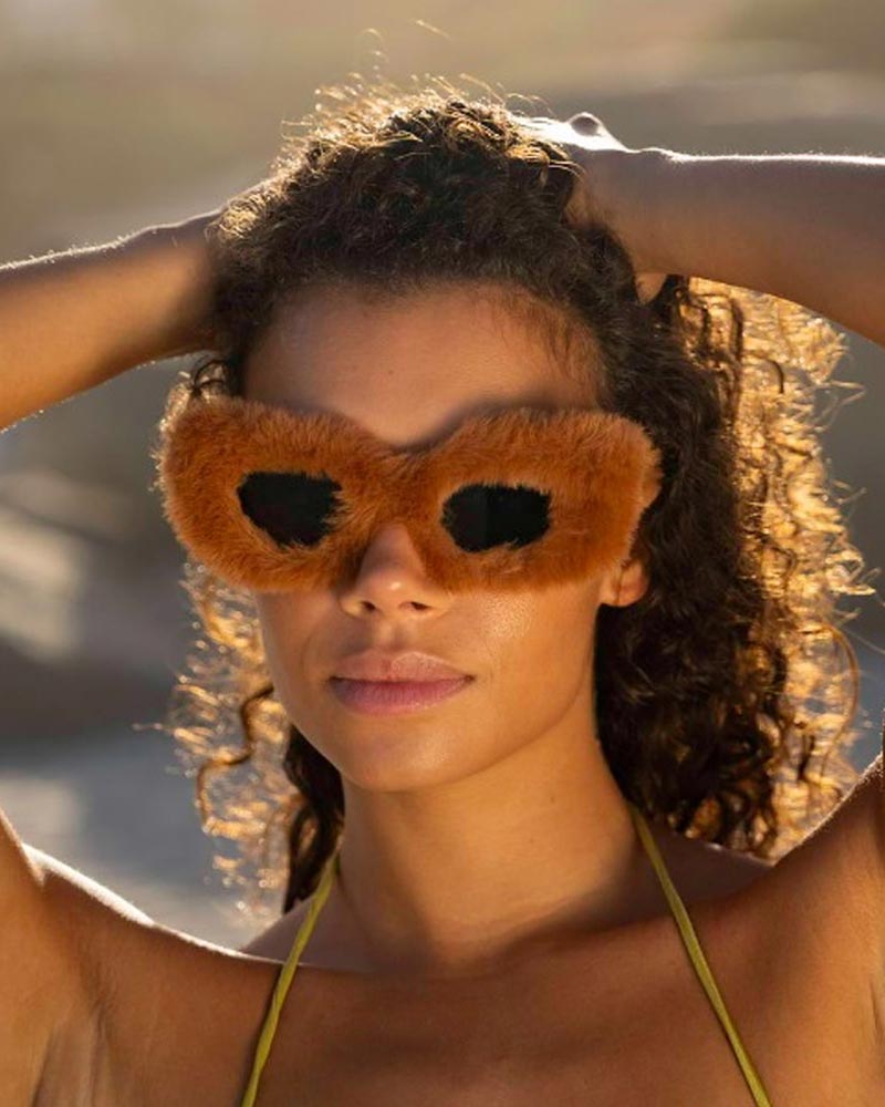 Heart-shaped sunglasses with pink lenses