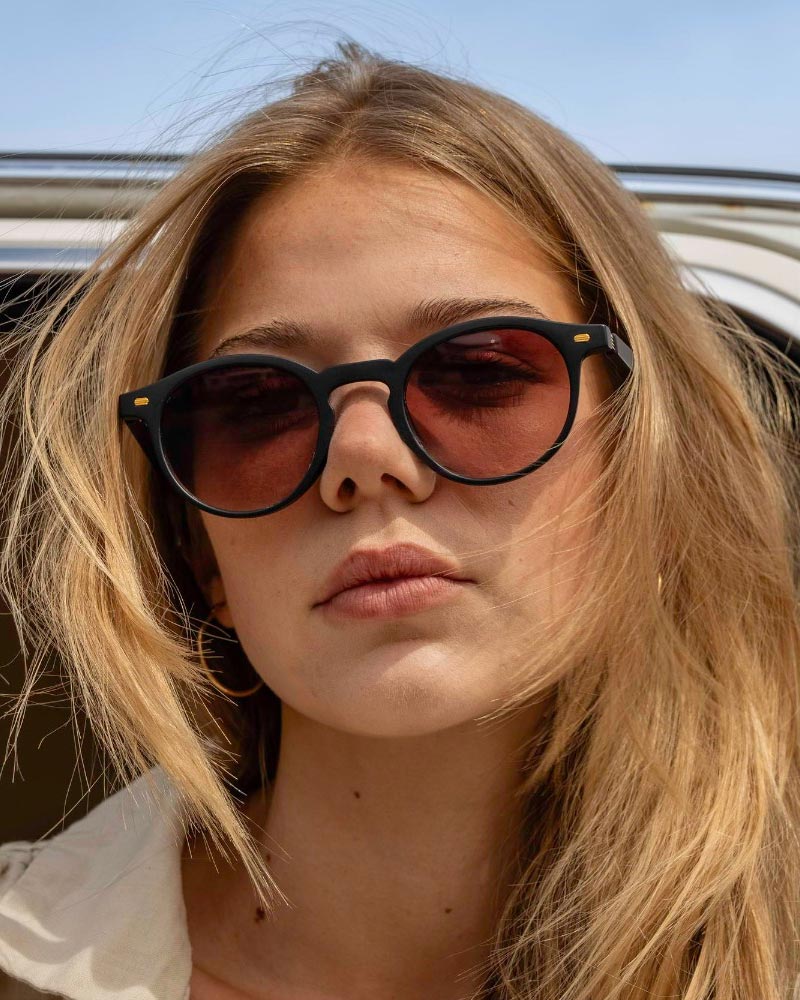 Heart-shaped sunglasses with pink lenses