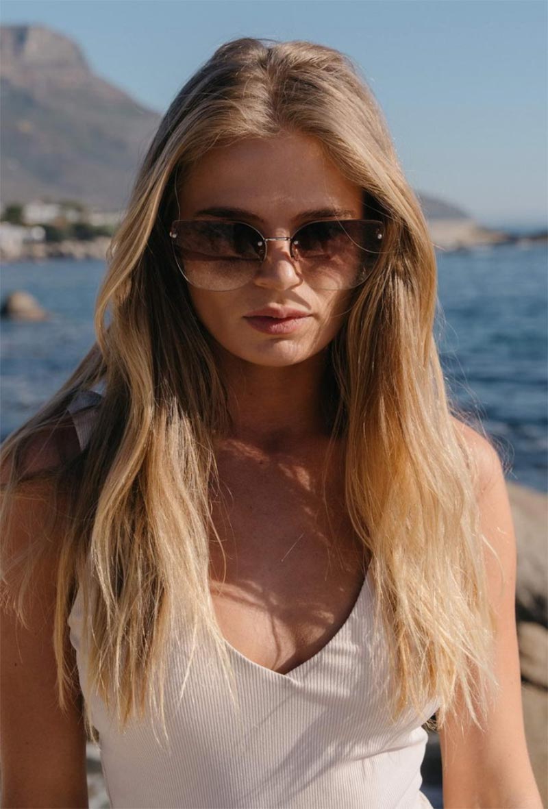 Oversized Cateye solglasögon i guld med bruna glas