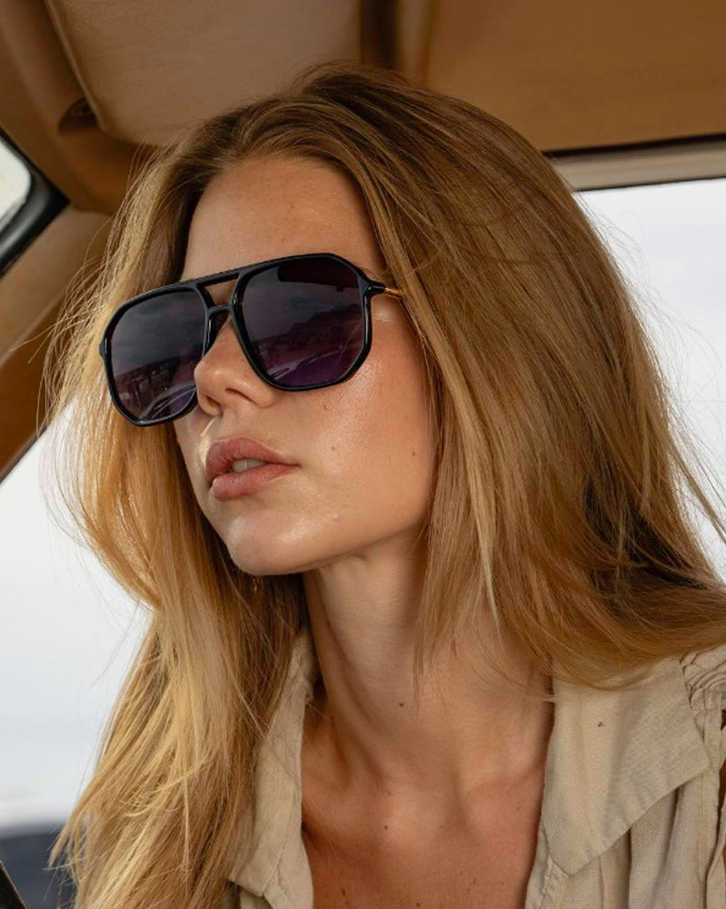 Heart-shaped sunglasses with pink lenses