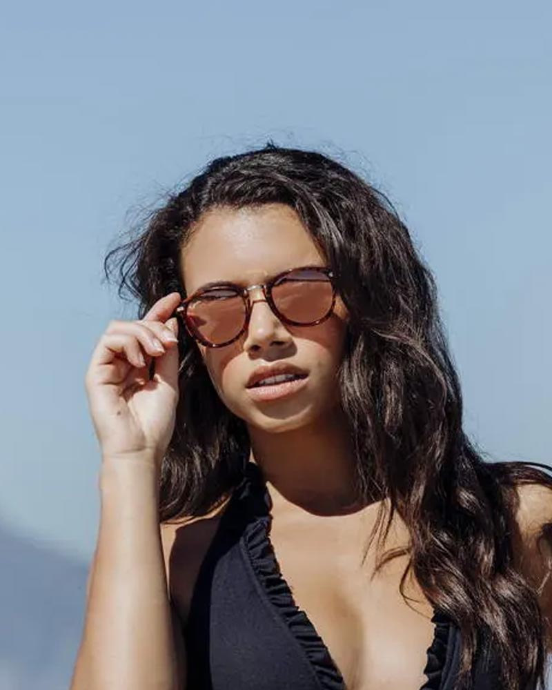 Heart-shaped sunglasses with pink lenses