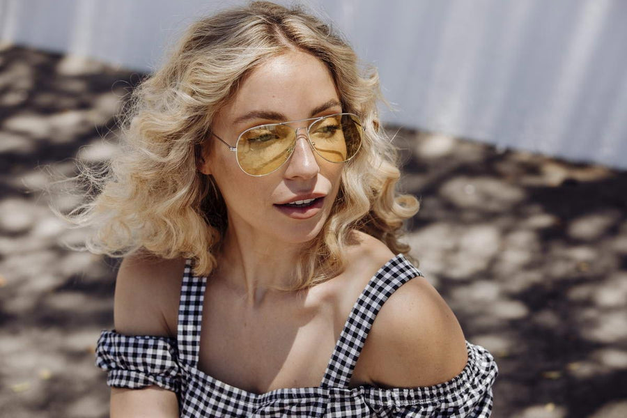 Heart-shaped sunglasses with pink lenses