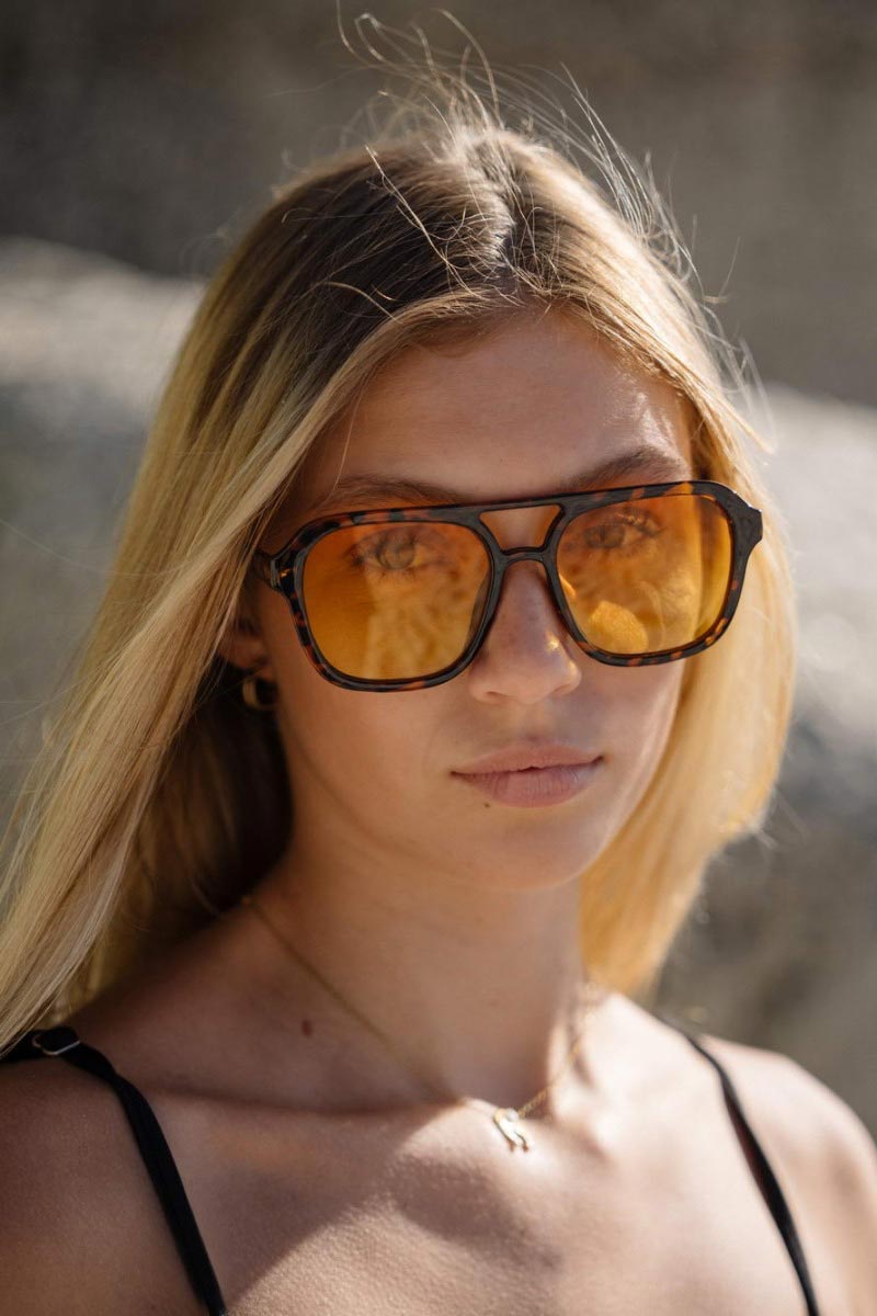 Heart-shaped sunglasses with pink lenses