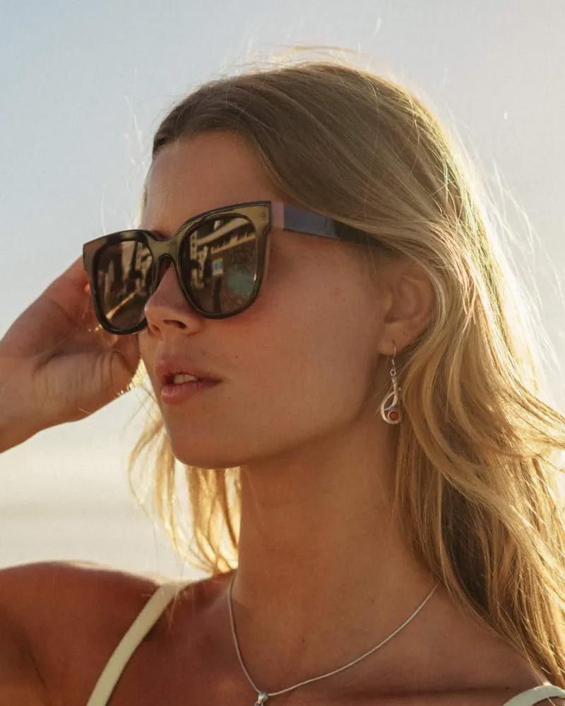 Heart-shaped sunglasses with pink lenses